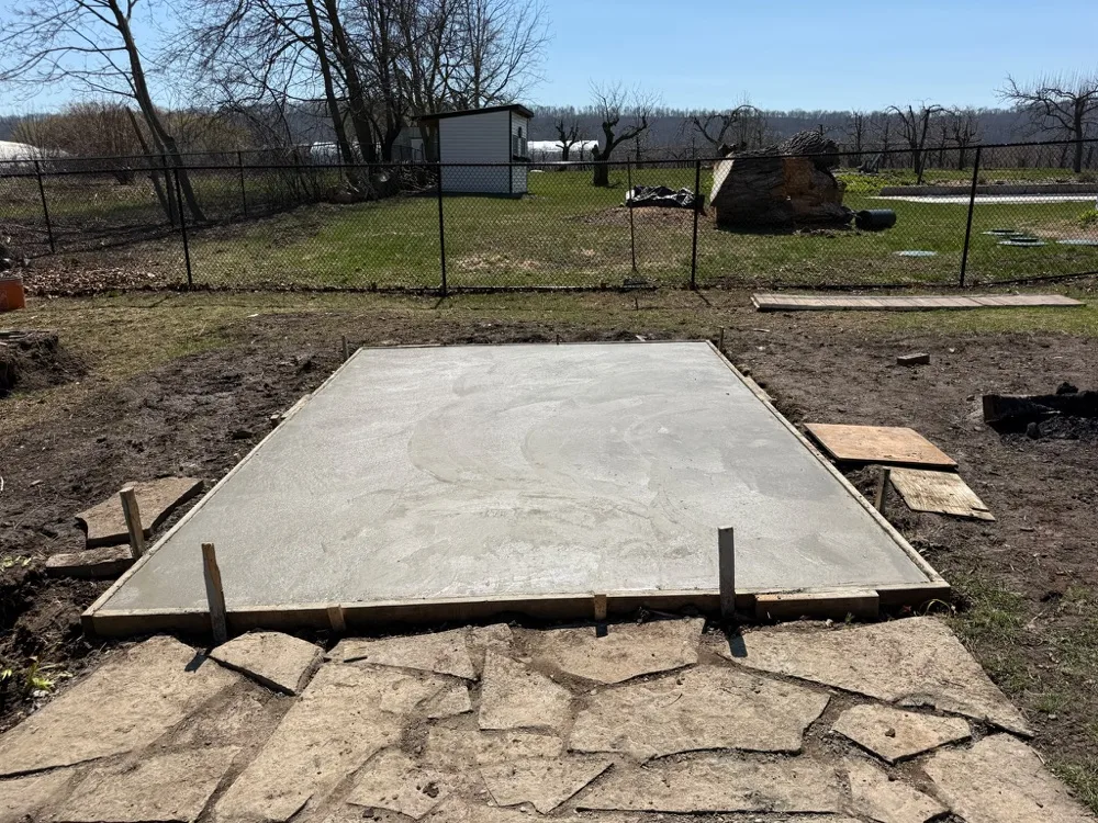 Poured concrete pad for a greenhouse in Stoney Creek, Ontario